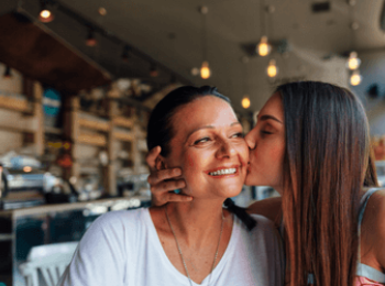 Daughter kisses Mother