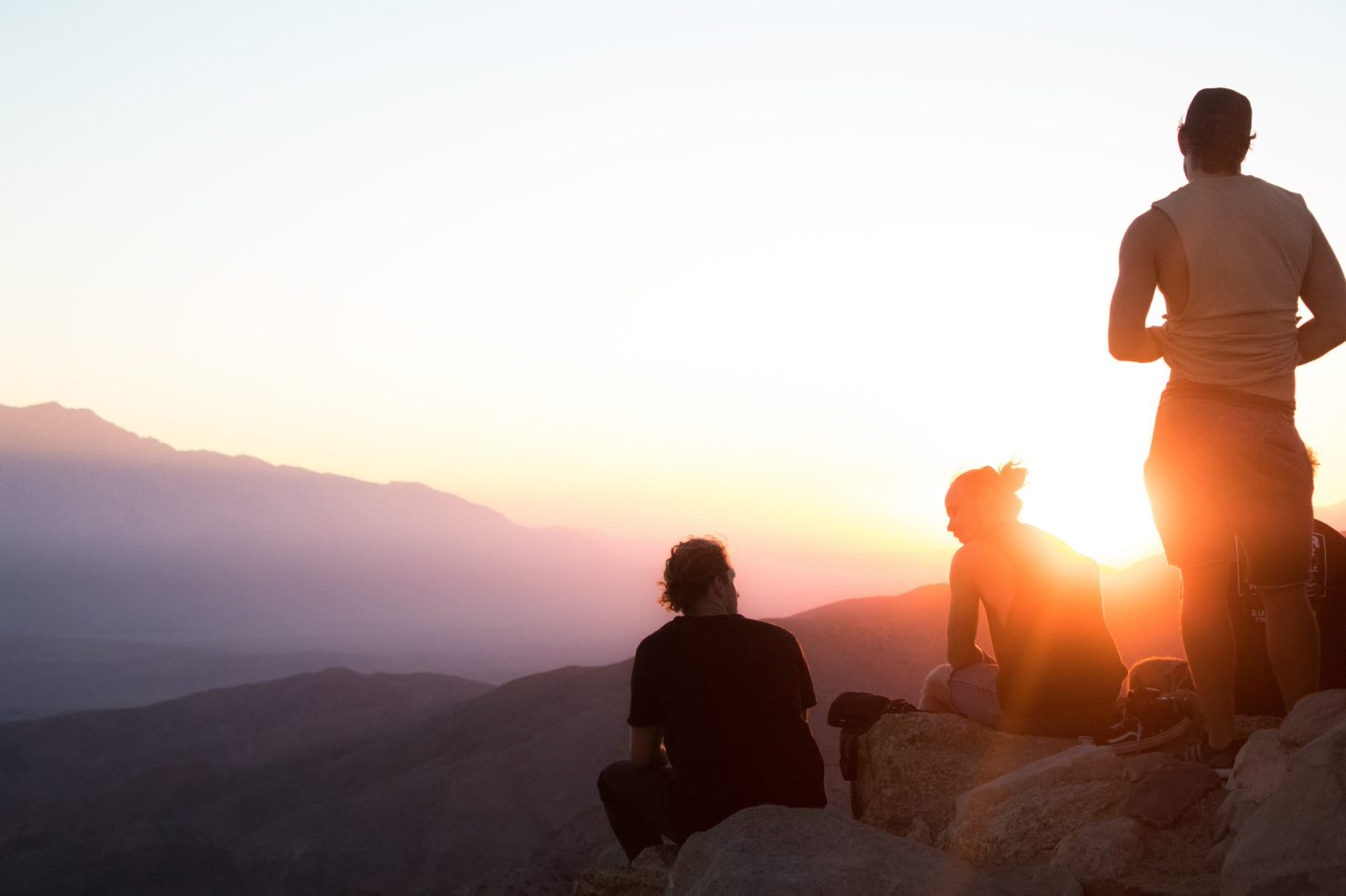 three friends on a hill