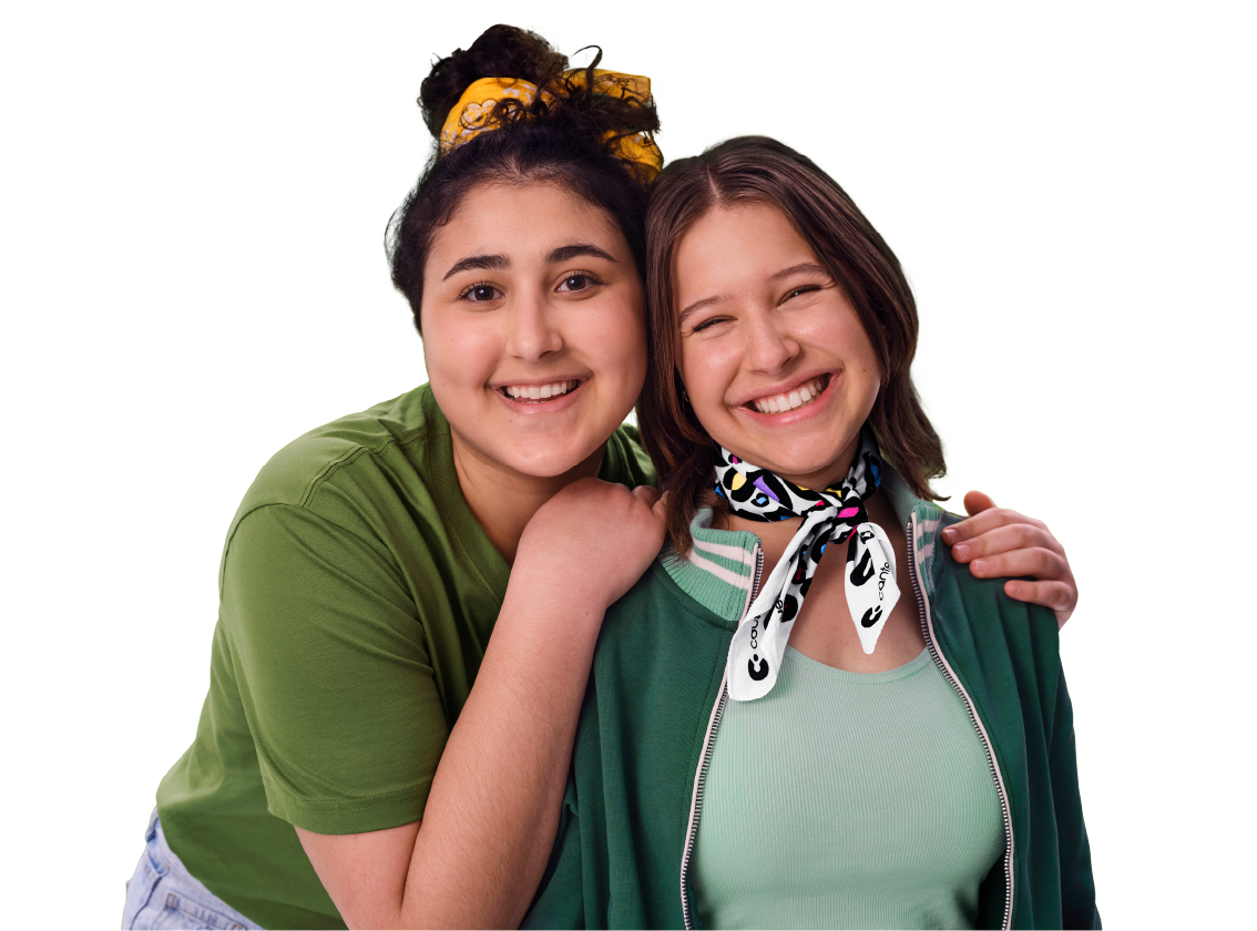 two people wearing bandannas smiling and embracing