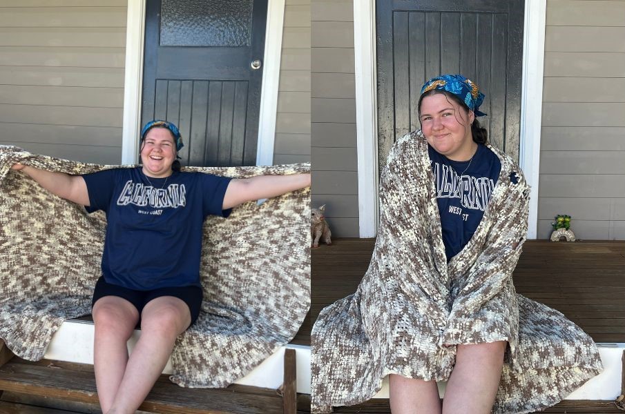 tara, a canteen youth ambassador, with a blanket that she crocheted