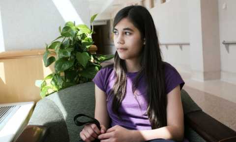 a young person in a waiting room