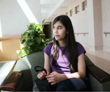 a young person in a waiting room